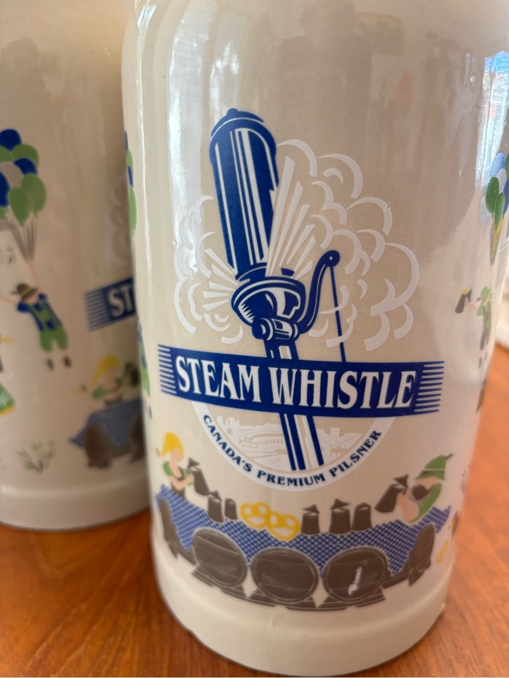 Pair of ceramic Steamwhistle Octoberfest beer steins
